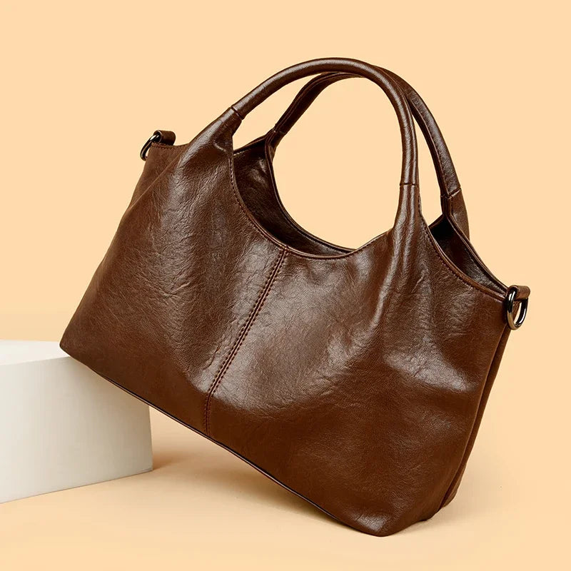 Yaffa Haya soft leather tote bag in red, black and coffee