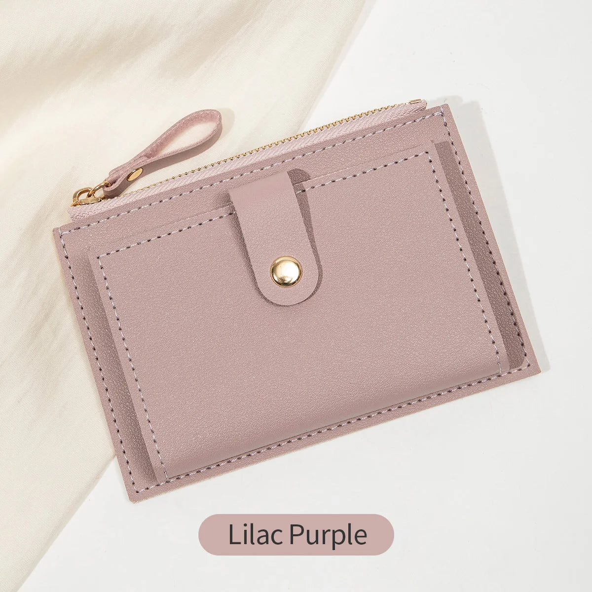 Yaffa Jana mini card wallet in beige, black, pink and blue