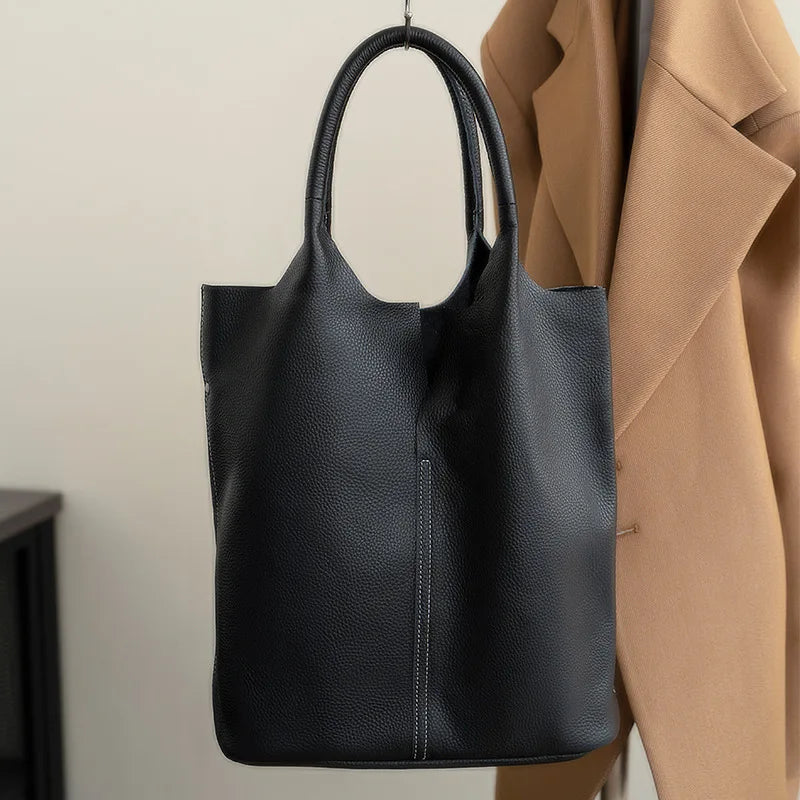 Yaffa Maya leather bucket tote bag in caramel, blue, black, khaki and gray