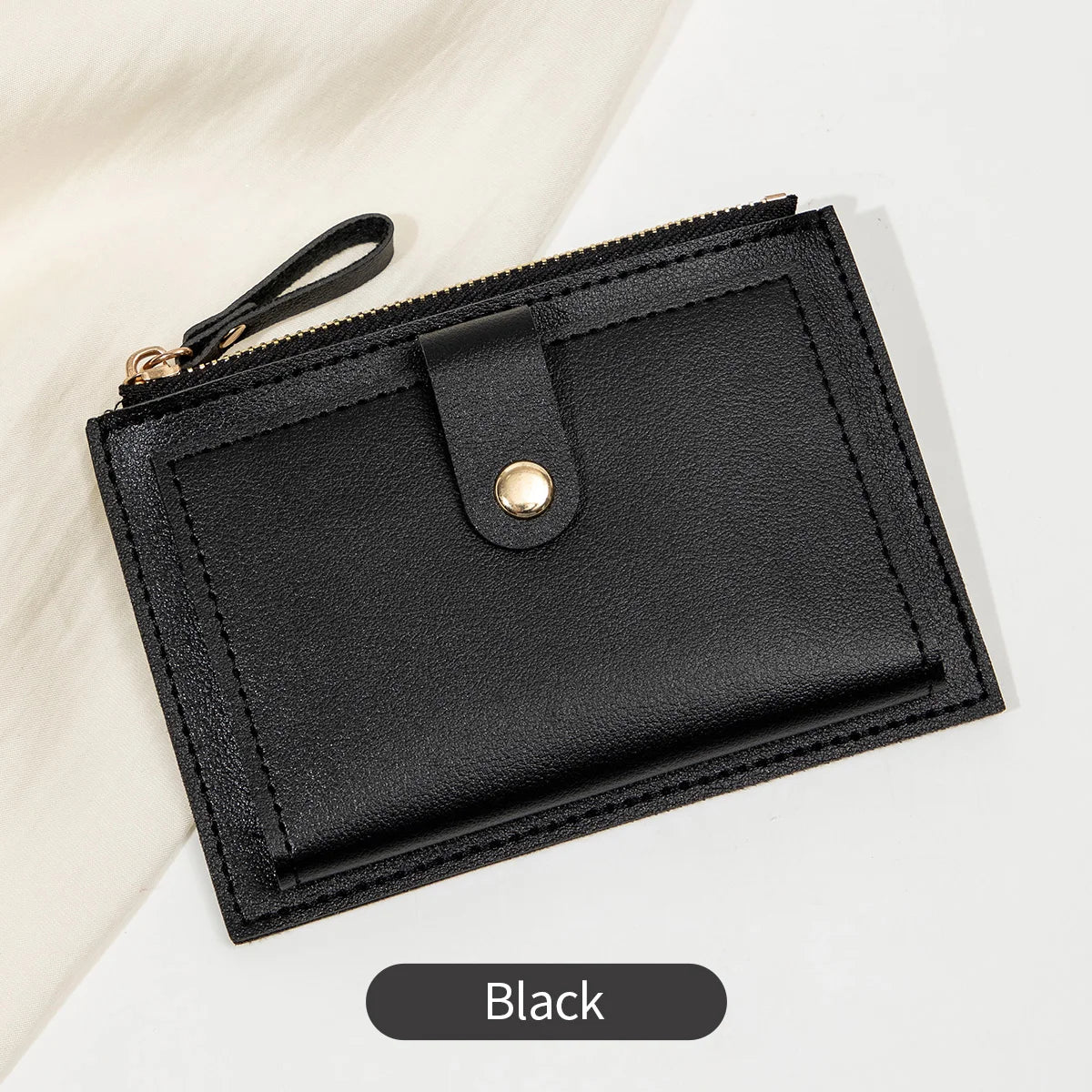 Yaffa Jana mini card wallet in beige, black, pink and blue