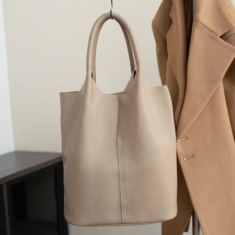 Yaffa Maya leather bucket tote bag in caramel, blue, black, khaki and gray