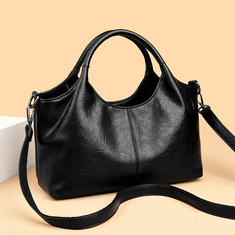 Yaffa Haya soft leather tote bag in red, black and coffee