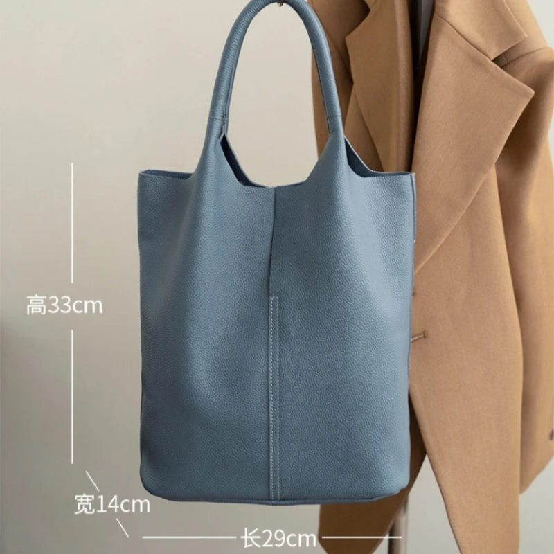 Yaffa Maya leather bucket tote bag in caramel, blue, black, khaki and gray