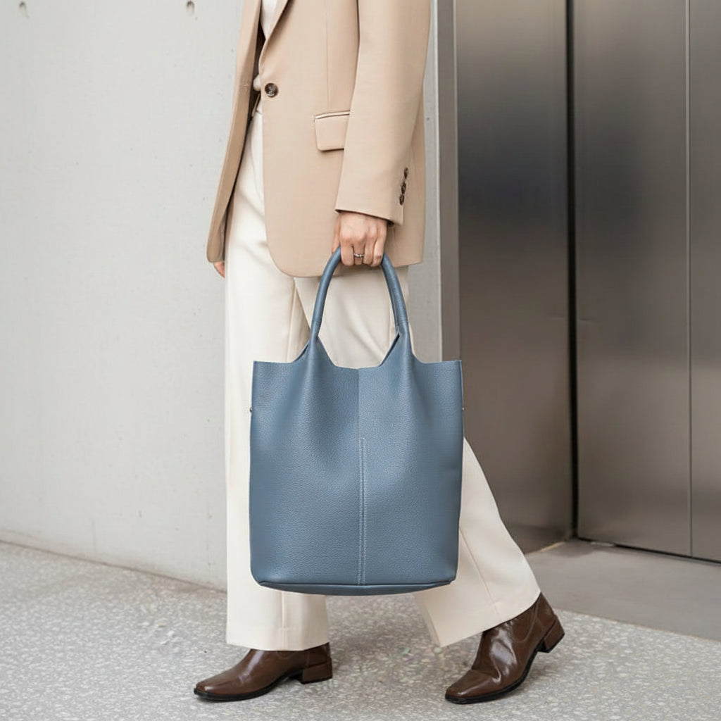 Yaffa Maya leather bucket tote bag in caramel, blue, black, khaki and gray
