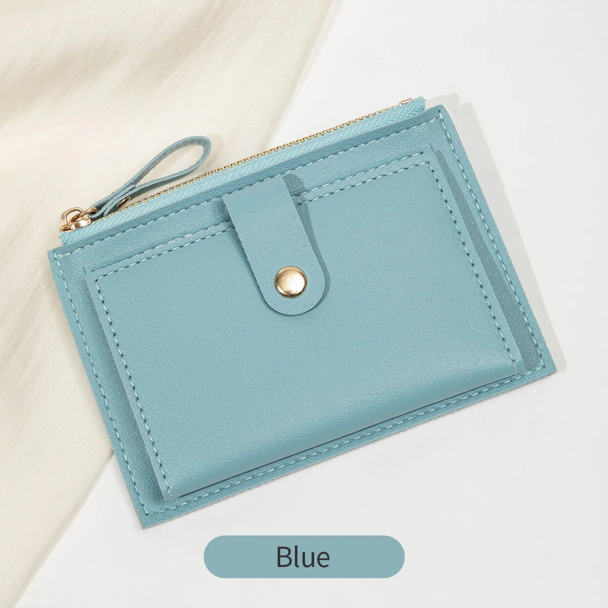 Yaffa Jana mini card wallet in beige, black, pink and blue