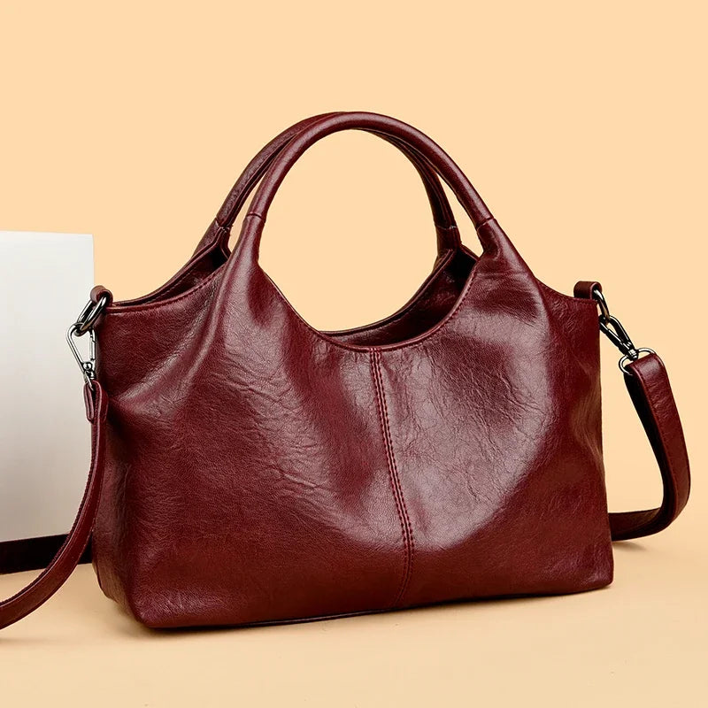 Yaffa Haya soft leather tote bag in red, black and coffee