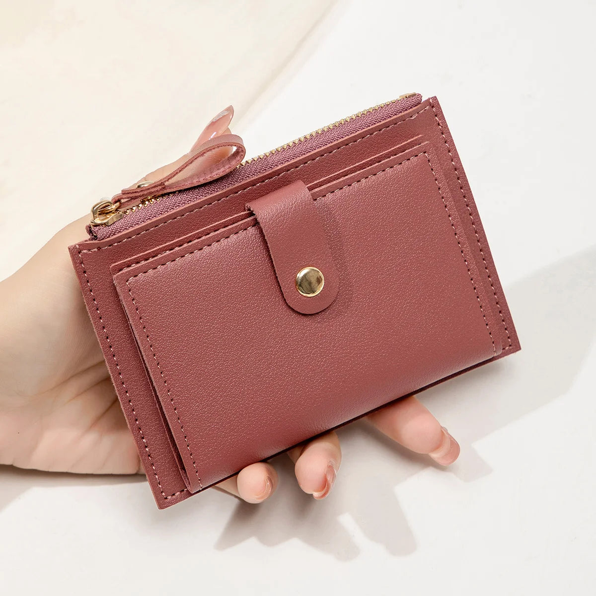 Yaffa Jana mini card wallet in beige, black, pink and blue