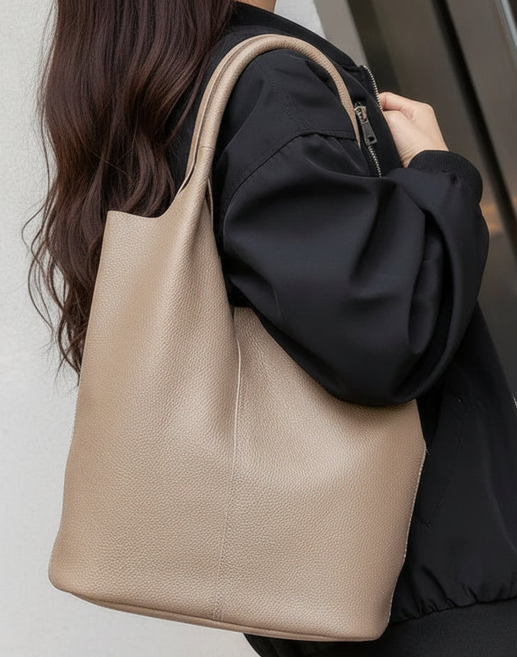 Yaffa Maya leather bucket tote bag in caramel, blue, black, khaki and gray
